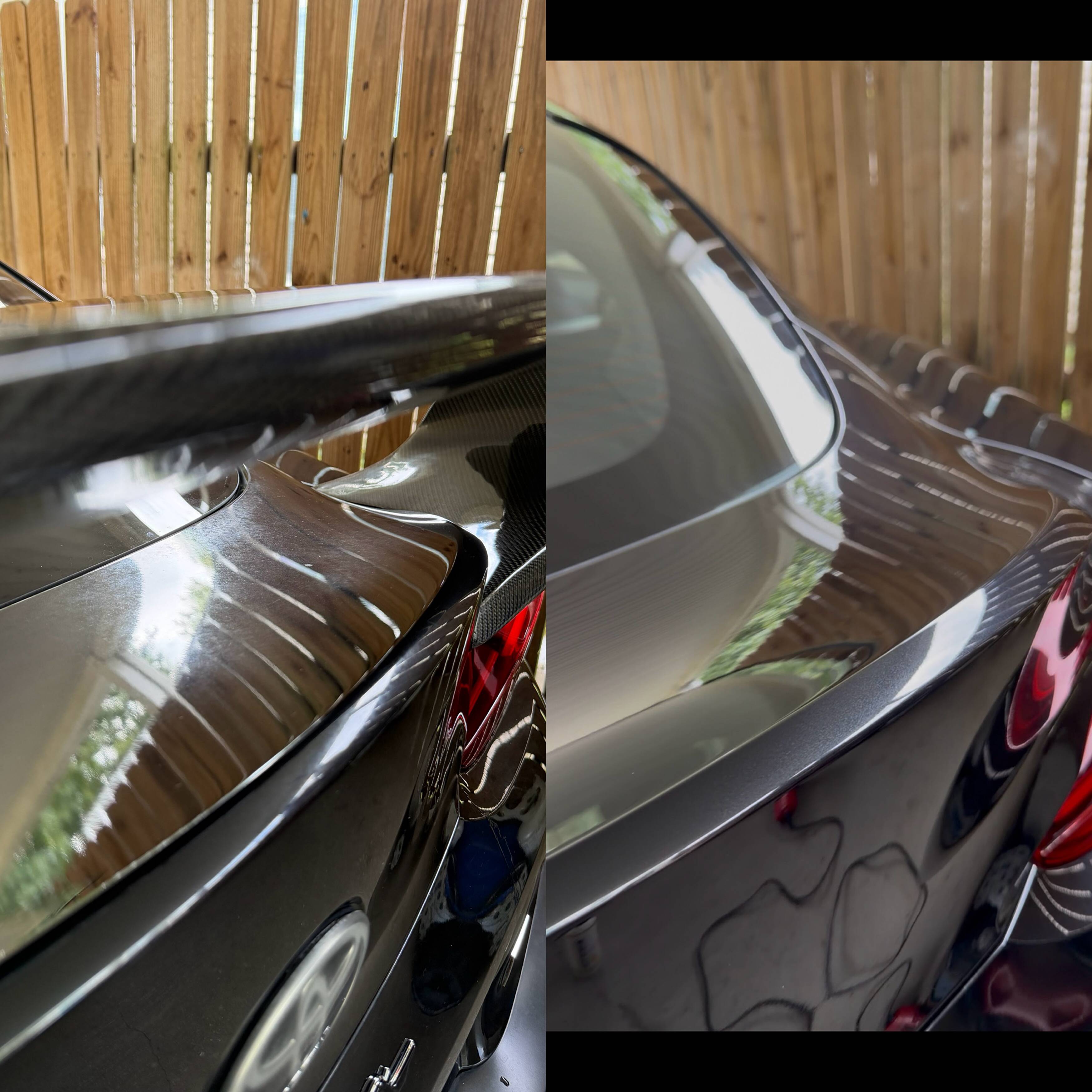 Deep gloss reflection across the rear quarter panel of a dark vehicle detailed by Bergeron's Detailing